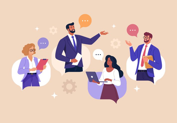 Four business professionals engaged in a collaborative discussion, with speech bubbles and gear icons symbolizing teamwork and communication.