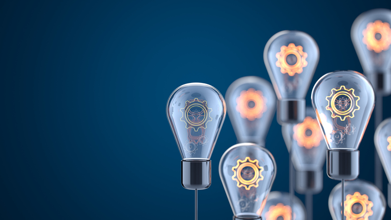 Illustration of glowing gear mechanisms inside transparent light bulbs on a dark blue background, symbolizing innovation, ideas, technology, and problem-solving.